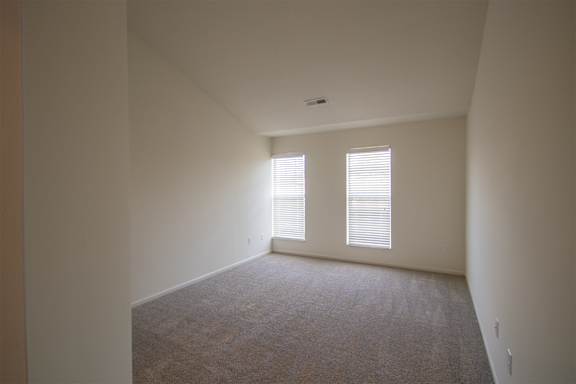 This is a photo of the bedroom of the 900 square foot 2 bedroom Miamisburg floor plan at Washington Park Apartments in Centerville, OH.