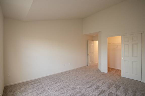 This is a photo of the bedroom of the 900 square foot 2 bedroom Miamisburg floor plan at Washington Park Apartments in Centerville, OH.