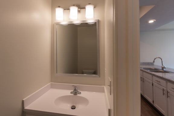 This is a photo of the half bath of the 1500 square foot 3 bedroom, 2 and a half bath with 2-car garage Bellbrook floor plan at Washington Park Apartments in Centerville, OH.