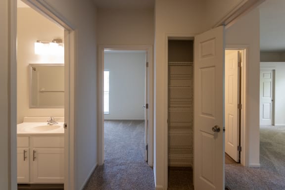 This is a photo of the linen closet in the upstairs hallway of the 1500 square foot 3 bedroom, 2 and a half bath with 2-car garage Bellbrook floor plan at Washington Park Apartments in Centerville, OH.
