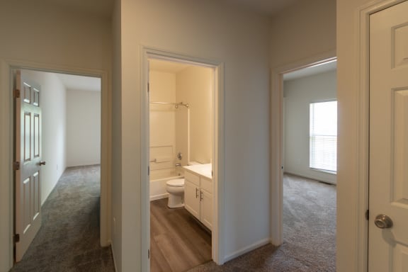 This is a photo of the upstairs hallway of the 1500 square foot 3 bedroom, 2 and a half bath with 2-car garage Bellbrook floor plan at Washington Park Apartments in Centerville, OH.