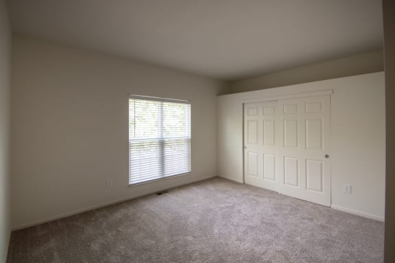 This is a photo of the second bedroom of the 1500 square foot 3 bedroom, 2 and a half bath with 2-car garage Bellbrook floor plan at Washington Park Apartments in Centerville, OH.