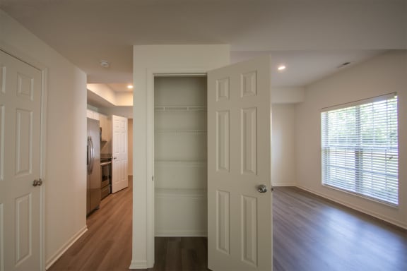 This is a photo of the living room closet of the 1500 square foot 3 bedroom, 2 and a half bath with 2-car garage Bellbrook floor plan at Washington Park Apartments in Centerville, OH.