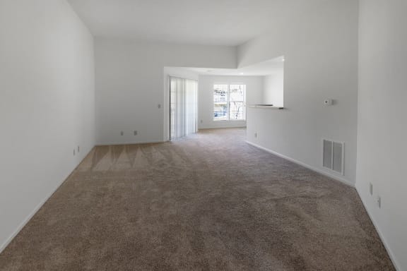 This is a photo of the living room of the 1100 square foot 2 bedroom, 2 bath Eaton floor plan at Washington Park Apartments in Centerville, OH.