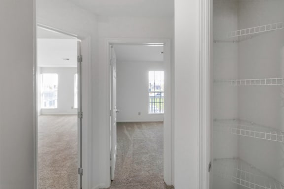 This is a photo of the hallway of the 1100 square foot 2 bedroom, 2 bath Eaton floor plan at Washington Park Apartments in Centerville, OH.