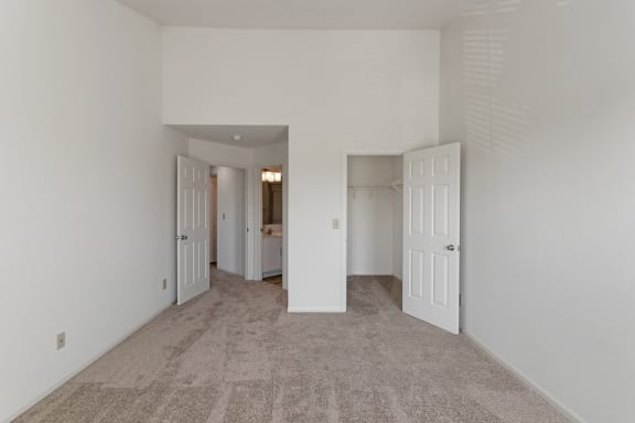 This is a photo of the primary bedroom of the 1100 square foot 2 bedroom, 2 bath Eaton floor plan at Washington Park Apartments in Centerville, OH.