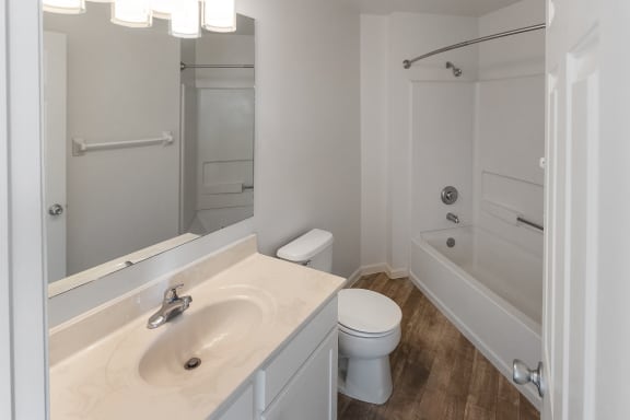 This is a photo of the primary bathroom of the 1100 square foot 2 bedroom, 2 bath Eaton floor plan at Washington Park Apartments in Centerville, OH.
