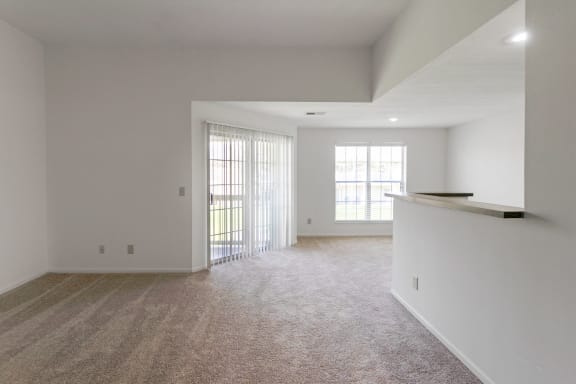 This is a photo of the living room of the 1100 square foot 2 bedroom, 2 bath Eaton floor plan at Washington Park Apartments in Centerville, OH.