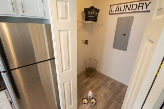 This is a photo of the laundry closet with washer and dryer connections of the 1100 square foot 2 bedroom Kettering at Washington Park Apartments in Centerville, OH.