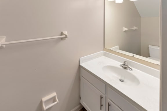 This is a photo of the half bath of the 1280 square foot 2 bedroom, 2 and 1/2 bath Oakwood floor plan at Washington Park Apartments in Centerville, OH.