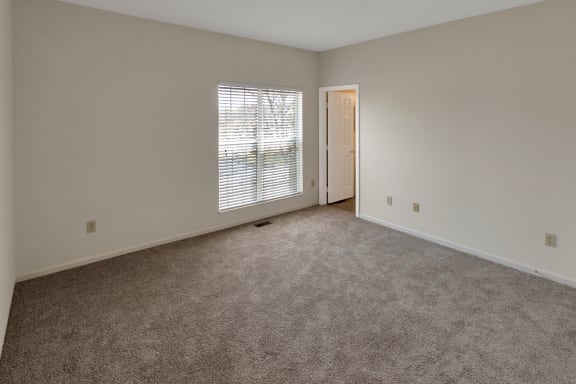 This is a photo of the second bedroom of the 1280 square foot 2 bedroom, 2 and 1/2 bath Oakwood floor plan at Washington Park Apartments in Centerville, OH.