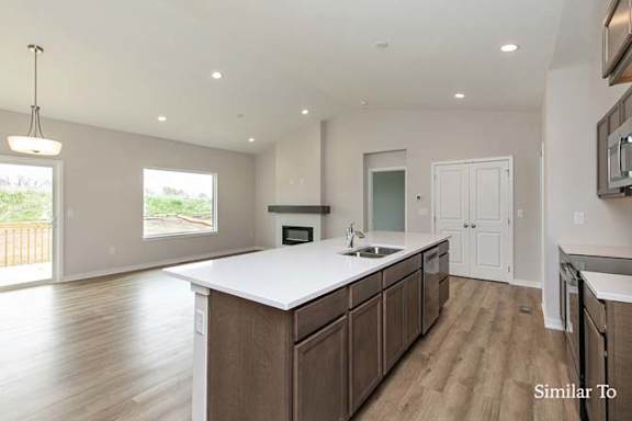 a large kitchen with a white counter top at Two Rivers Home Rentals, West Des Moines