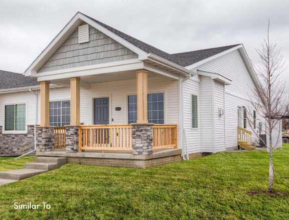 Floor Plan  a white house with a porch and a green lawn at Two Rivers Home Rentals, West Des Moines, 50266