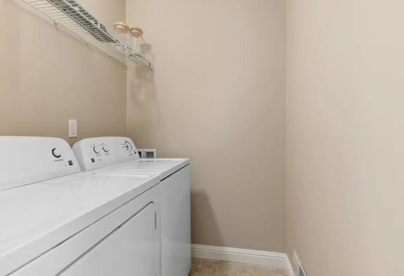 Laundry Room with Washers and Dryers at Encore Townhomes, Utica, 48315