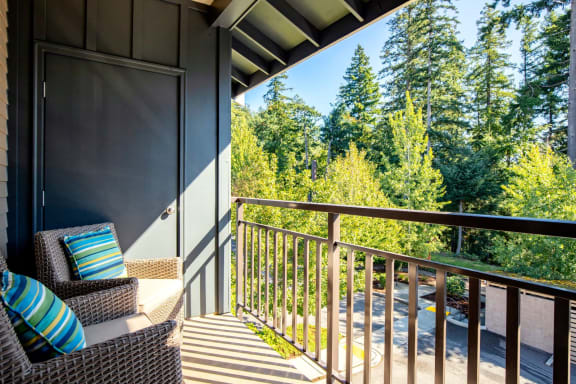 balcony overlooking green pine landscaping at  Discovery Heights in Issaquah, Washington