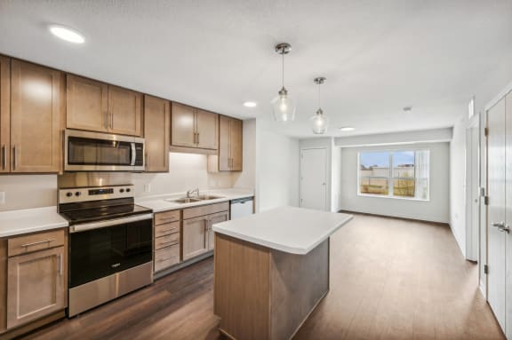 the preserve at ballantyne commons apartment kitchen with wooden cabinets