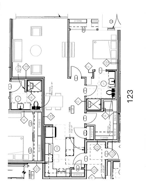 A detailed black and white architectural floor plan of a building.