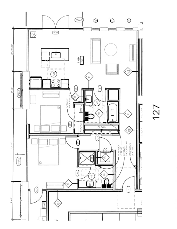 A floor plan of a house with labeled rooms and dimensions.
