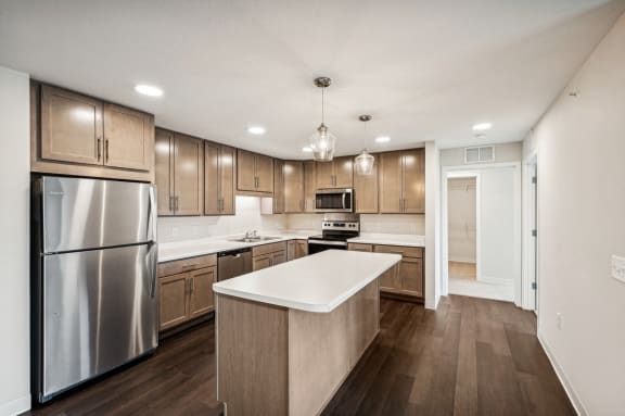 the preserve at ballantyne commons apartment kitchen with stainless steel appliances