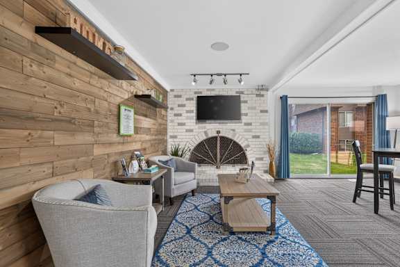 Community clubhouse with coworking lounge at Drawbridge Apartments in Harrison Township, MI.