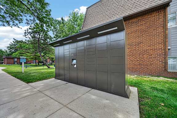 24/7 secured Package Lockers at Drawbridge Apartments in Harrison Township, MI