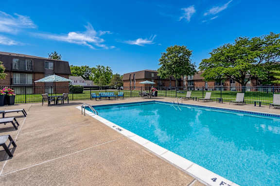 Heated pool and sundeck at Drawbridge Apartments in Harrison Township, MI.