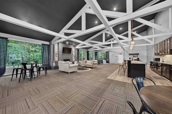 Clubhouse with coworking lounge at Eastwood Village Apartments in Clinton Township, MI.