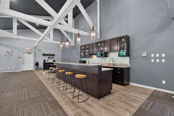 Clubhouse with coworking lounge at Eastwood Village Apartments in Clinton Township, MI.