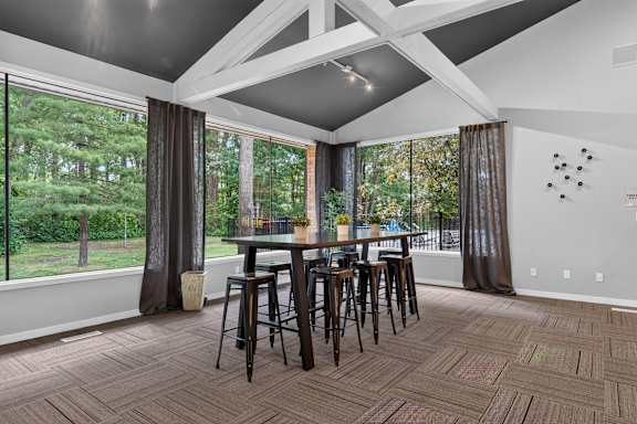 Clubhouse with coworking lounge at Eastwood Village Apartments in Clinton Township, MI.