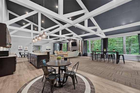 Clubhouse with coworking lounge at Eastwood Village Apartments in Clinton Township, MI.