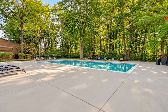 Heated swimming pool and sundeck at Eastwood Village Apartments in Clinton Township, MI.