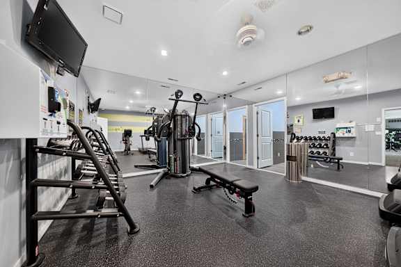 24-hour fitness center and sauna at Eastwood Village Apartments in Clinton Township, MI.