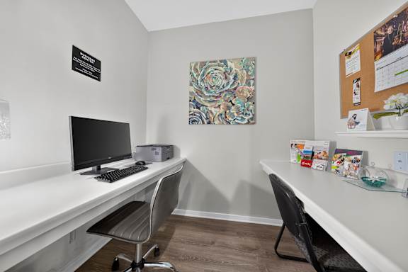 Clubhouse with coworking lounge at Eastwood Village Apartments in Clinton Township, MI.