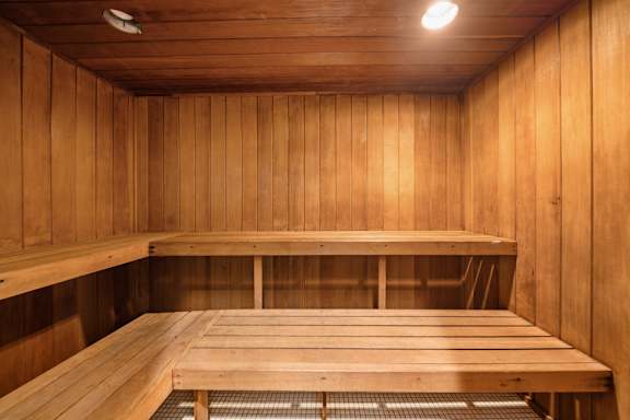 Updated 24-hour fitness and wellness center with dry sauna at Knottingham Apartments in Clinton Township, MI.
