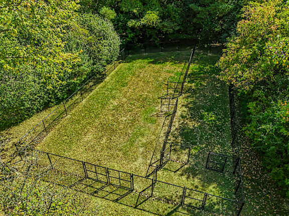 Spacious pet park at Three Oaks Apartments in Troy, MI.