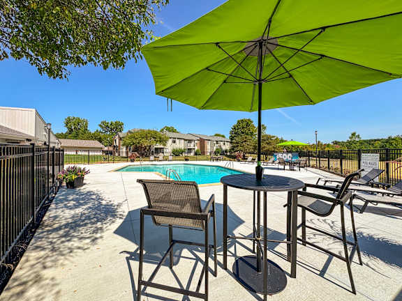 Heated pool and sundeck at Three Oaks Apartments in Troy, MI.