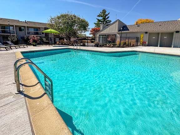 Heated pool and sundeck at Three Oaks Apartments in Troy, MI.