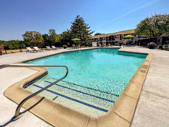 Heated pool and sundeck at Three Oaks Apartments in Troy, MI.
