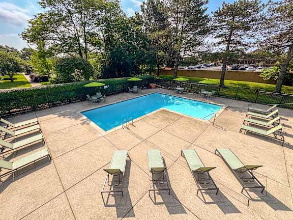 Poolside Relaxation Area at Woodland Villa Apartments, Westland, 48185