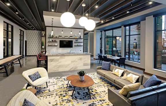 Community Room couch and tv  at 1500 Nicollet, Minneapolis