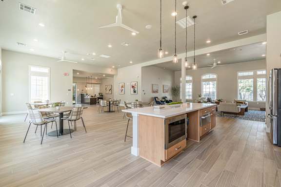 the preserve at ballantyne commons clubhouse with dining room and living room