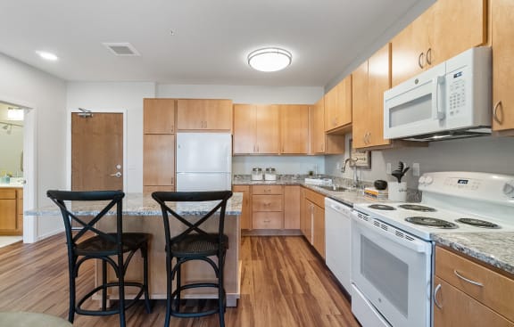 Dining And Kitchen at Legacy Commons at Signal Hills 55&#x2B; Apartments, West St. Paul
