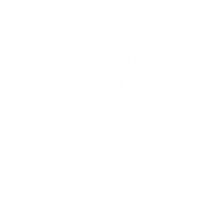 A white and black image of an award badge for the Grace Hill Excellence Awards for 2026.