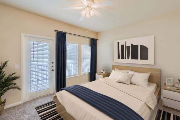 Bedroom with bed&#xA0;at Lakeside Pointe Apartments &amp; Townhomes, Texas