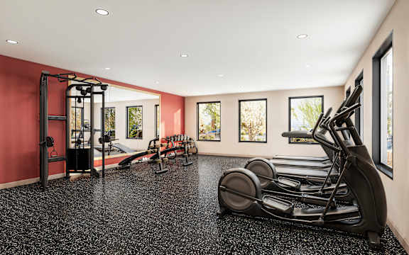 A black treadmill and weights are in a room with red walls.