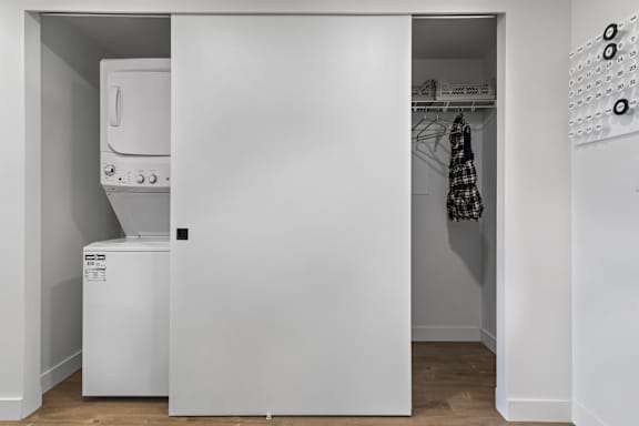 A white oven and fridge in a small kitchen.