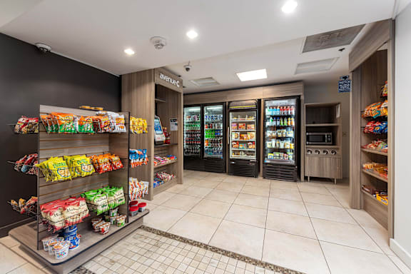 A frozen food section of a grocery store at Clayton on the Park Apartments, Clayton, Missouri