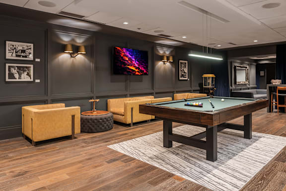 A room with a pool table and a television at Clayton on the Park Apartments, Clayton