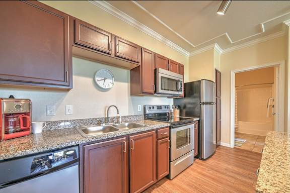 a view of a kitchen with glass cabinets