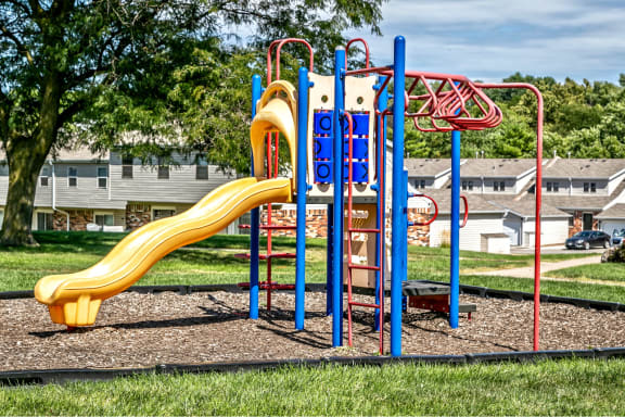 the playground at the preserve at polk apartments with slides